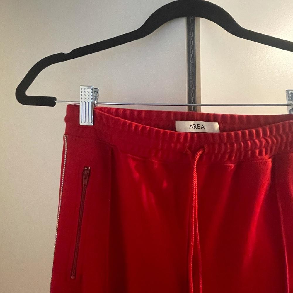 Area red trouser with crystal embellishing.